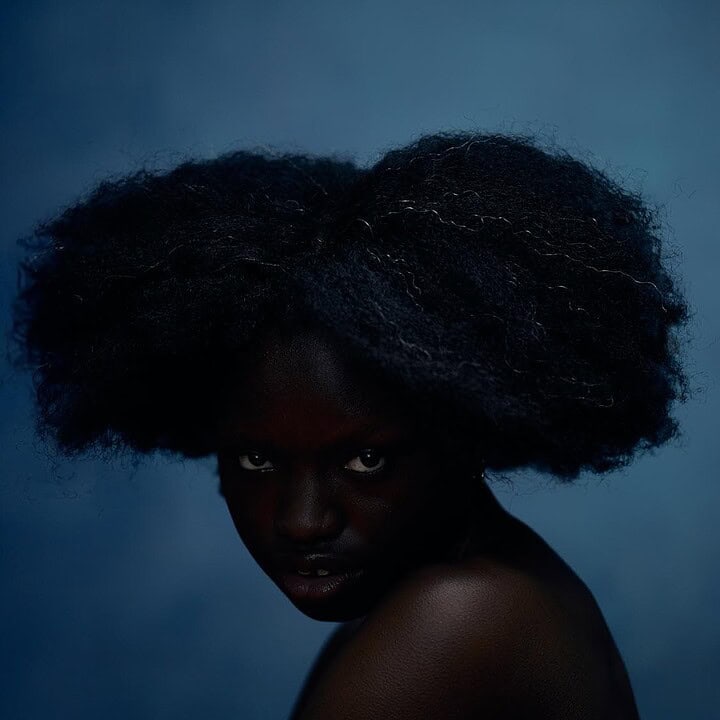Ogechi portrait artwork by Maria Panina in the Quiet Strength exhibition catalog